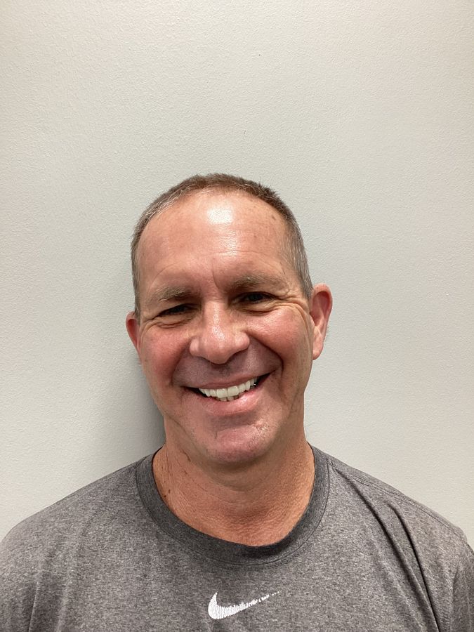 Secure Dental patient smiling after treatment