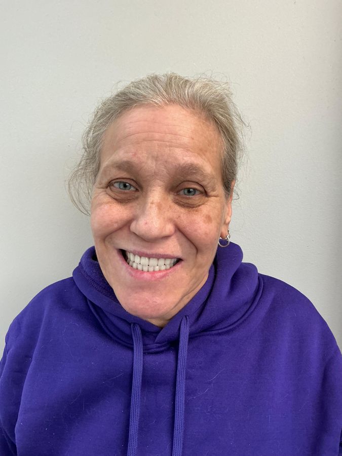 Secure Dental patient smiling after treatment