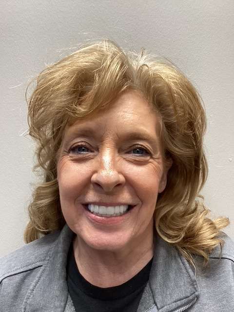 Secure Dental patient smiling after treatment